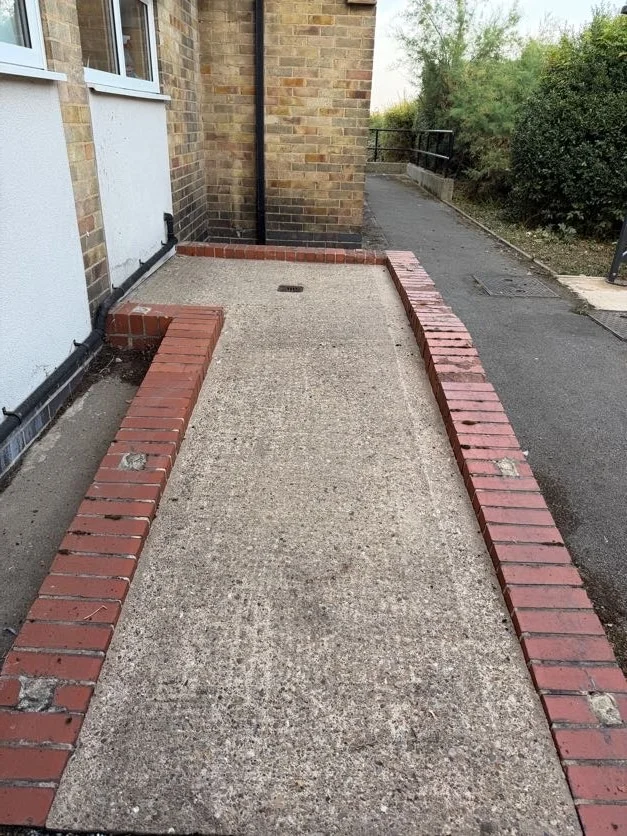 Walkway in Derby after pressure washing: clean and restored
